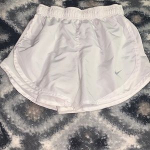 White Nike shorts, good condition, one little red mark on back